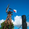 Farm & Ranch Supply. Windmill. Fence.