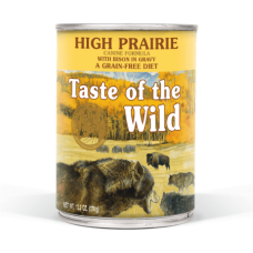 Taste of the Wild High Prairie Canine Formula with Bison in Gravy Wet Dog Food. Yellow can of pet food. Prairie scene.