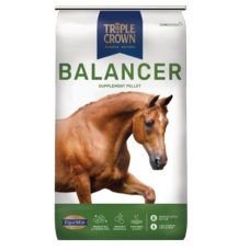 Triple Crown 30% Ration Balancer Horse Feed. Equine pelleted supplement. White and green feed bag.