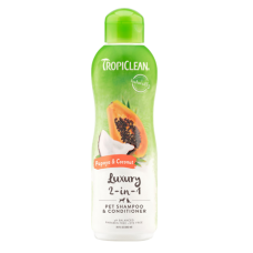 TropiClean Papaya & Coconut Luxury 2-in-1 Pet Shampoo & Conditioner. White plastic bottle. Green pet grooming label.