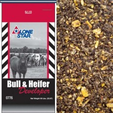Lone Star Bull & Heifer Developer Pellets (Medicated). Brown mixed grains fed to cattle. 